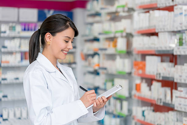 istock Pharmacist doing the inventory at a drugstore 610573040