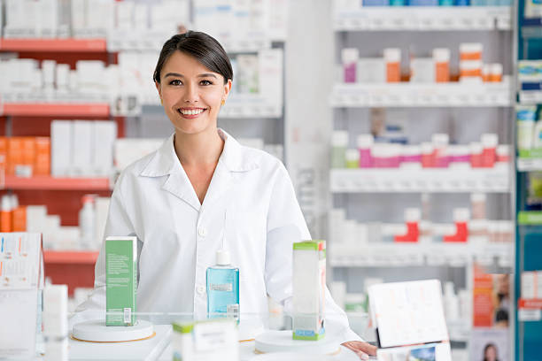 istock Woman working at a pharmacy 610573118