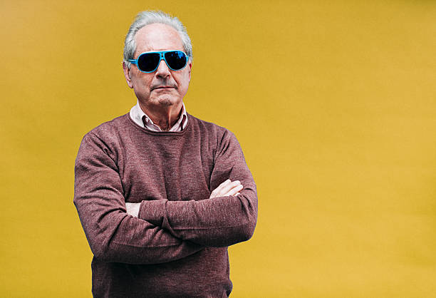 istock Why so serious? - Funny senior businessman portrait 610576180
