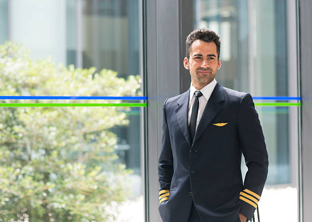istock Airline pilot in airport terminal 610577064