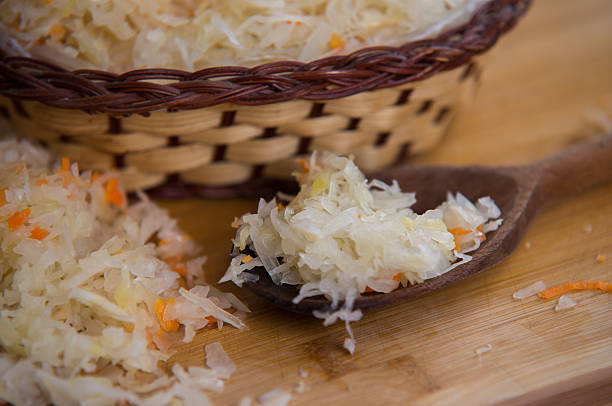 istock close up on Sauerkraut on wooden plate 610577166