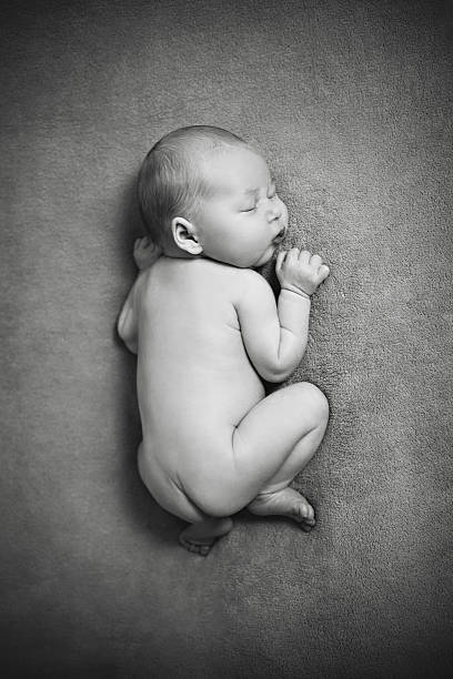 istock Cute Newborn Baby Is Sleeping 610578160