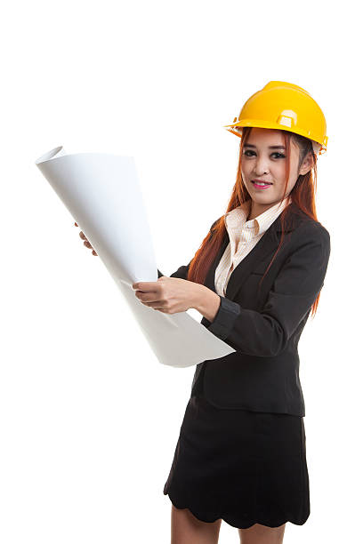 istock Asian engineer woman with blueprints. 610578578