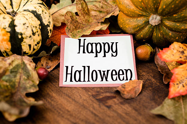 istock Happy Halloween!  Autumn centerpiece with leaf decorations. 610579052