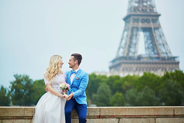 istock Just married couple near the Eiffel tower in Paris 610579992
