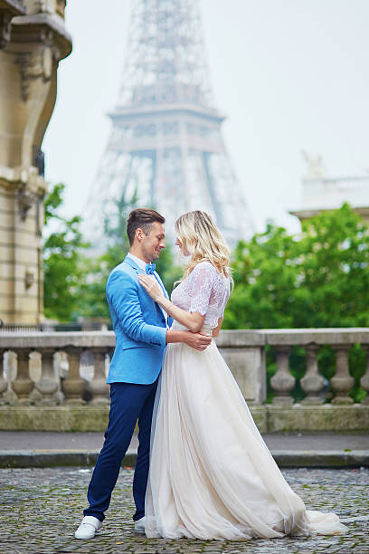 istock Just married couple near the Eiffel tower in Paris 610580446