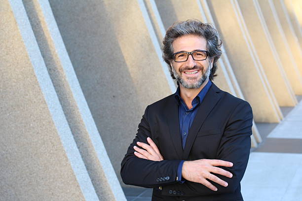 istock Portrait of an elegant CEO smiling 610580586