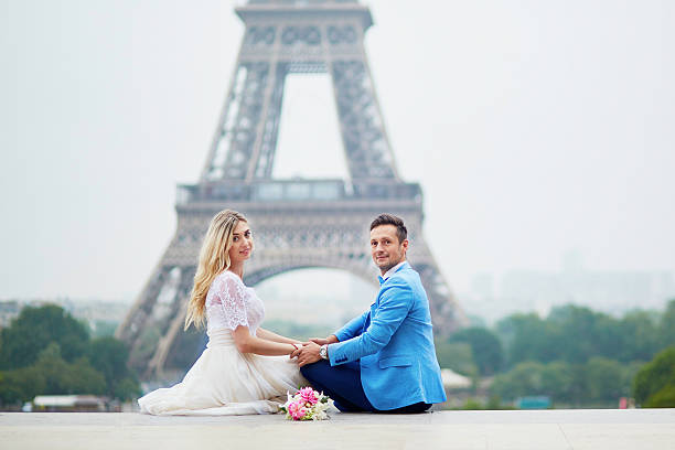istock Just married couple near the Eiffel tower in Paris 610581048