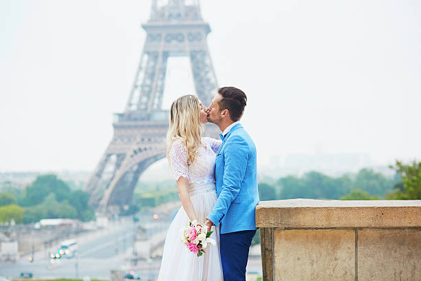 istock Just married couple near the Eiffel tower in Paris 610582240