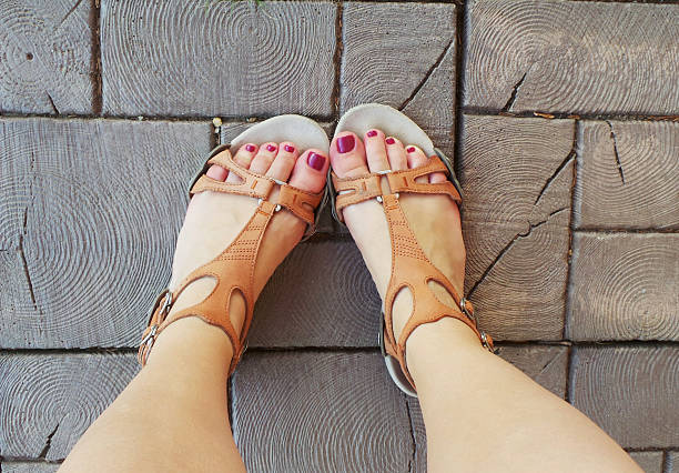 istock Woman's Feet with Red Pedicure 610582846