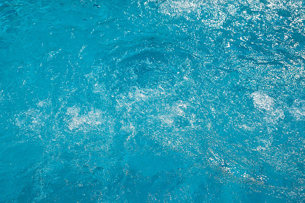 istock Beautifull Blue water surface in swimming pool 610583450