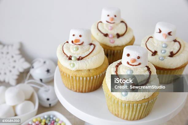 Fun Homemade Melting Snowman Cupcakes For Kids Stock Photo - Download Image Now - Cupcake, Christmas, Muffin