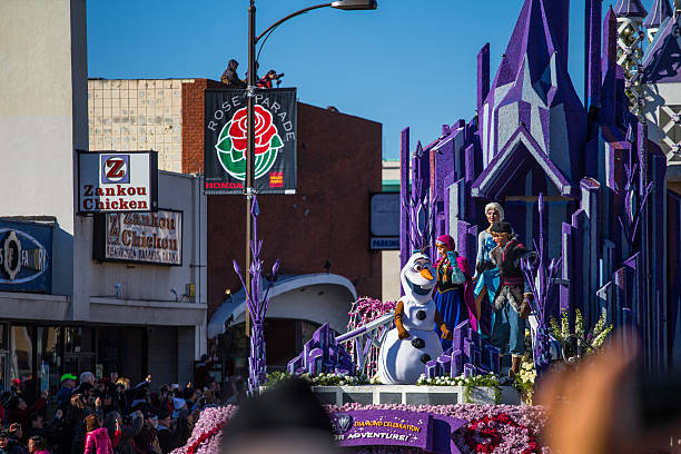 Philadelphia, PA, USA - November 27, 2014: Recording artist Sheena Easton is seen waving as she stands on one of the floats participating in the Philadelphia Thanksgiving Day Parade. Seen in the background is a Bob the Builder ballon.