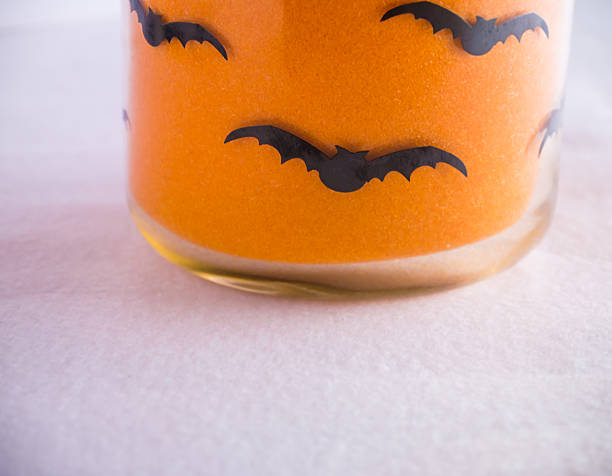 istock Mysterious orange powder of Halloween atmosphere 610645892