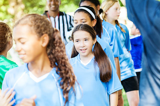 istock Girls soccer team congratulate winners 610648738
