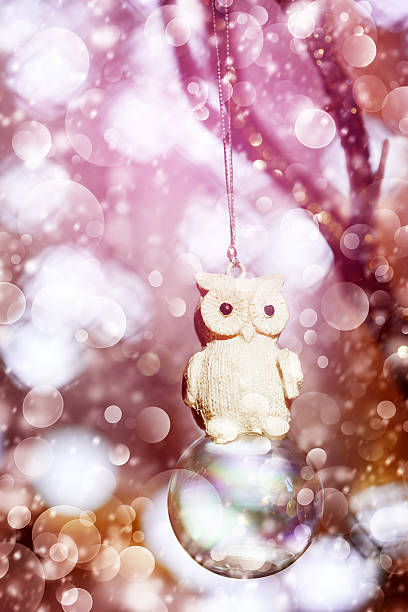 Snowy Christmas decoration with vintage owl, bright and light