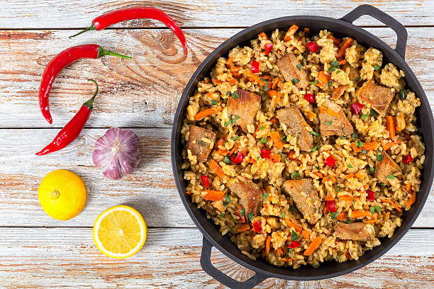 istock paella with meat, pepper, vegetables and spices 610650626
