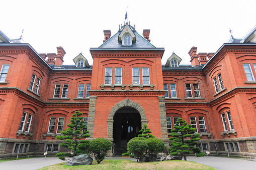 Sapporo, Hokkaido, Japan – July 31, 2015: View of Former Hokkaido Government Office building in summer season. Now here is the historical museum and popular tourist attraction in Sapporo.