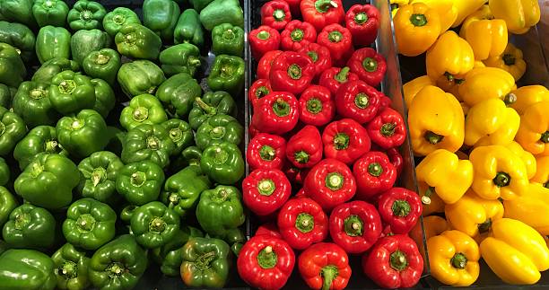 istock Capsicums in green, red and yellow colors 610651684