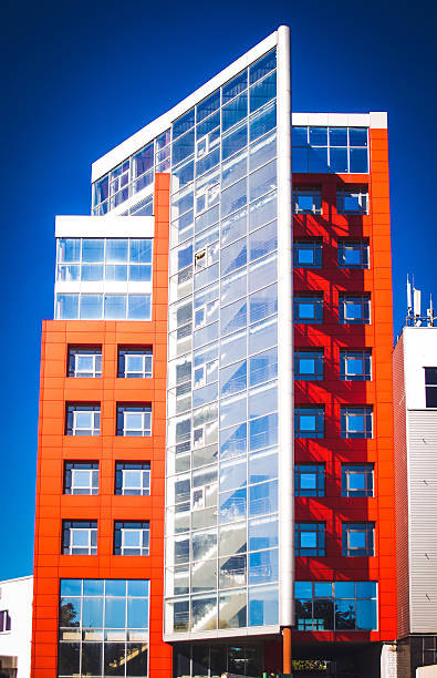 istock facade of the house red in the high-tech style 610652440