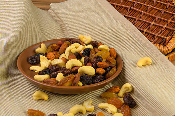 istock raisins and nuts in a saucer 610653226