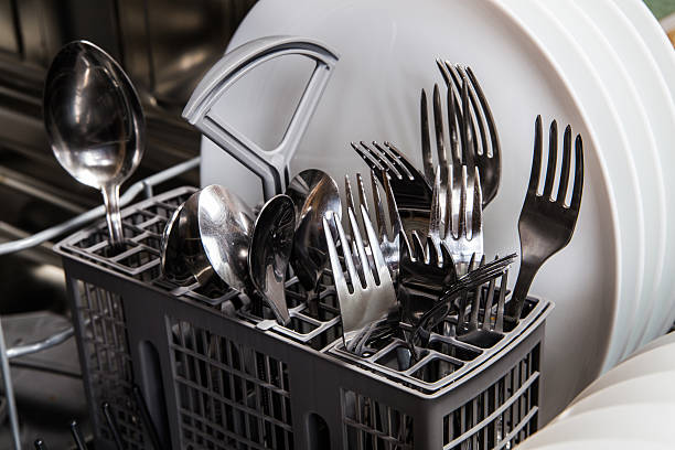 istock Steel forks and plates in dishwasher machine 610654272