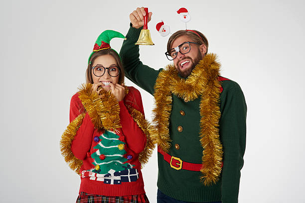 istock Nerd couple announces the Christmas 610654562