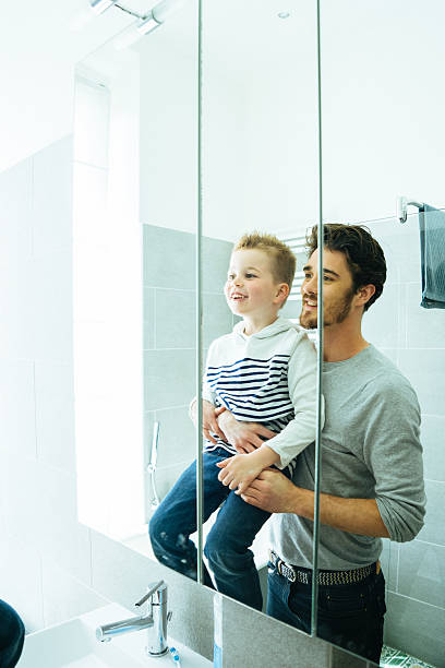 istock Father And Son Getting Ready In The Morning 610655560