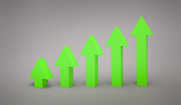 istock business Green arrow line graph pointing up 3d rendering 610655748