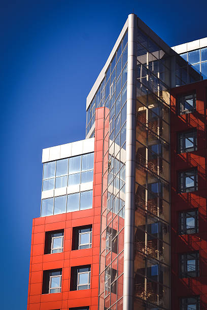 istock facade of the house red in the high-tech style 610655850