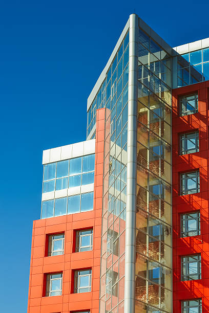 istock facade of the house red in the high-tech style 610655934