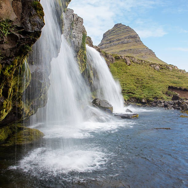 istock Kirkjufellsfoss waterfall near the Kirkjufell mountain 610657576