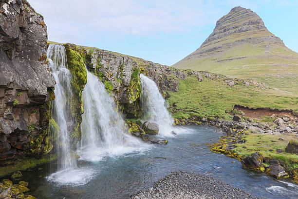 istock Kirkjufellsfoss waterfall near the Kirkjufell mountain 610657672