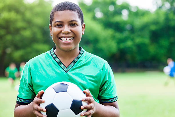 istock Excited African American soccer player 610658000