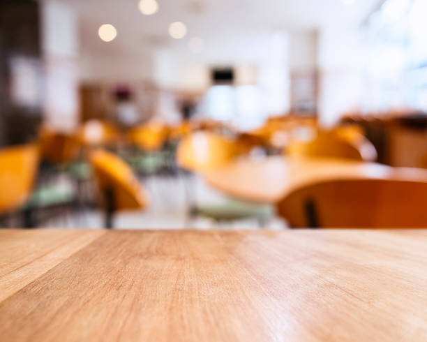 istock Table top counter and Seats Blurred People Restaurant Shop Cafe 610660532