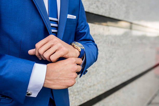 istock Unrecognizable businessman with elegant wristwatch. 610660606