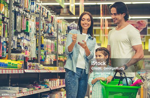 Family In The Supermarket Stock Photo - Download Image Now - Shopping, Education, Retail