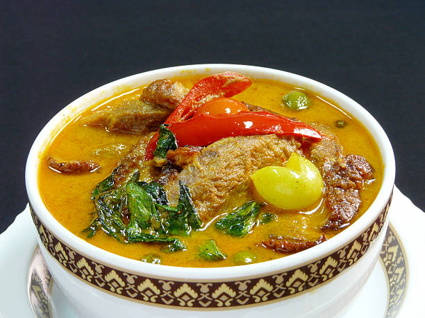 thai food - gaeng phet ped yang - red curry with roast duck