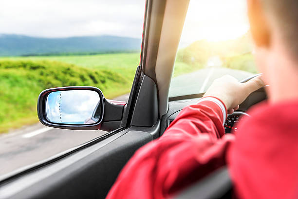 istock Hands on wheel of a car. 610664174