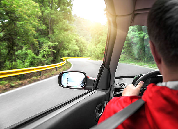 istock Hands on wheel of a car. 610664670