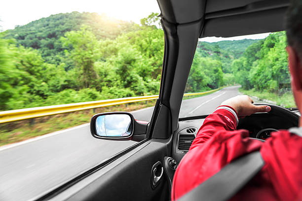 istock Hands on wheel of a car. 610665092