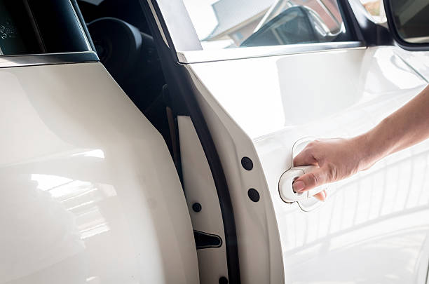 istock Hand opening luxury car door 610665250