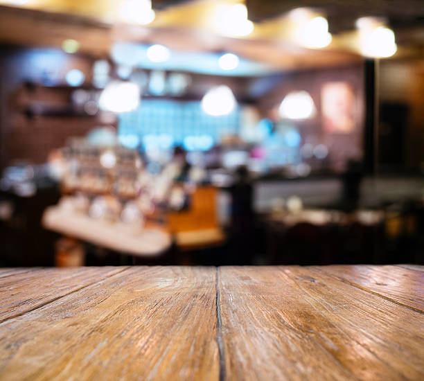 istock Table top counter Blurred Bar restaurant cafe People interior 610667796