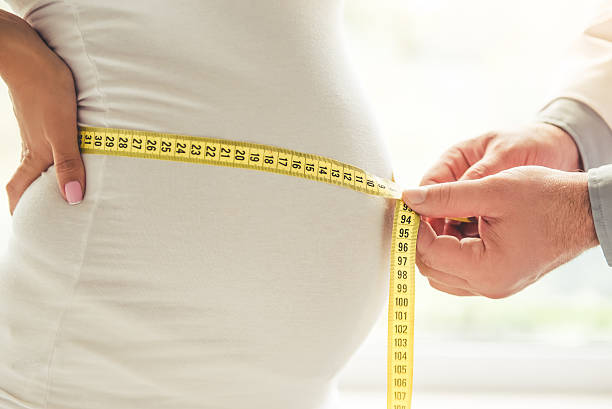 istock Pregnant woman visiting a doctor 610668418