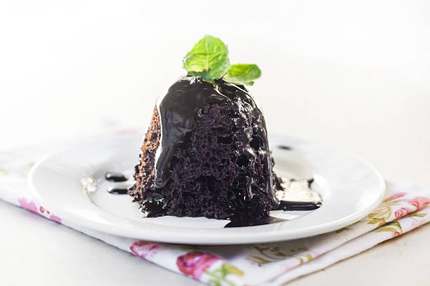 istock to split off from a piece of chocolate cake 610669588
