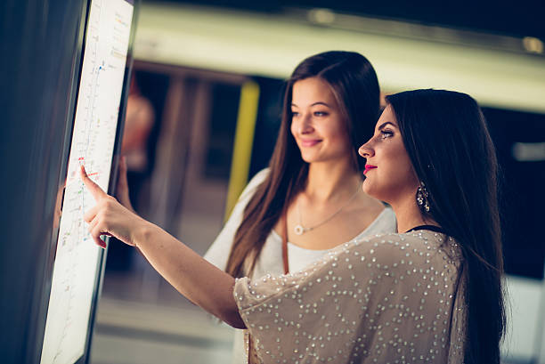 istock woman at the information board 610670146