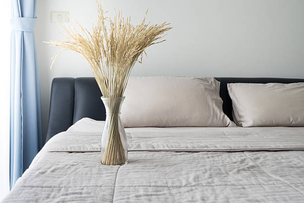 istock Dried tree rice in a glass bottle  on the bed. 610671672