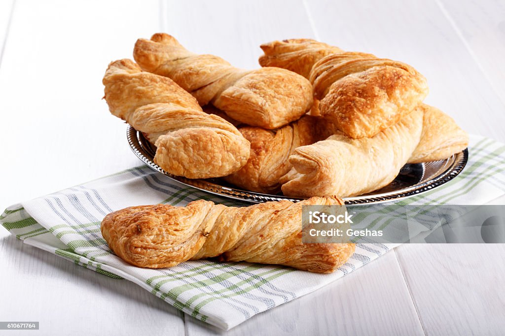 Twisted puff pastry Twisted puff pastry stuffed with salmon and herbs Puff Pastry Stock Photo