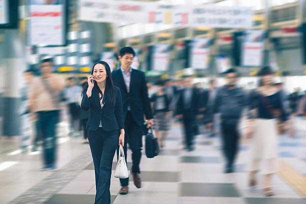 istock Japanese business people commuting 610672442
