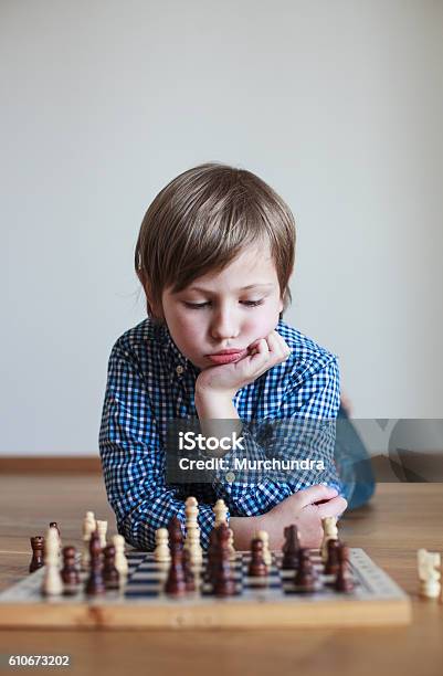 Cute Boy Playing Chess Stock Photo - Download Image Now - Boys, Chess, Chess Board